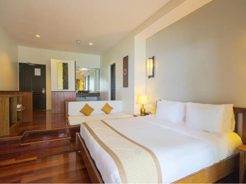 Quartos em marrom e branco criam refúgio tranquilo